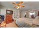 Spacious main bedroom with large dresser, tv and closet, providing ample storage at 8970 W Lone Mountain Rd, Las Vegas, NV 89129