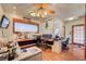 Bright office space with wood floors, large window, and ample desk space for a productive work environment at 8970 W Lone Mountain Rd, Las Vegas, NV 89129