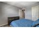 Neutral bedroom featuring a view of the closet and doorway at 900 Harbor Ave, Henderson, NV 89002