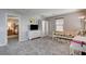 Bright bonus room with sunflower decor, daybed, and ample space at 900 Harbor Ave, Henderson, NV 89002