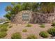 Stone sign for the Pearl Creek community with desert landscaping at 900 Harbor Ave, Henderson, NV 89002
