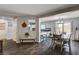 Open dining area with wood floors, stylish furnishings, and views to the modern kitchen at 900 Harbor Ave, Henderson, NV 89002