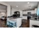 Bright kitchen with granite countertops, stainless appliances, and breakfast bar with seating at 900 Harbor Ave, Henderson, NV 89002