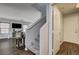 Inviting living room with wood flooring and open staircase at 900 Harbor Ave, Henderson, NV 89002