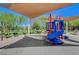Vibrant community playground with colorful play structure featuring a slide and climbing area at 900 Harbor Ave, Henderson, NV 89002