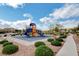 Community playground with blue and yellow slides at 900 Harbor Ave, Henderson, NV 89002