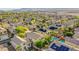 Extensive aerial view of a vibrant neighborhood showcasing homes equipped with solar panels at 9052 Pine Mission Ave, Las Vegas, NV 89143