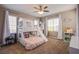 Cozy bedroom featuring a unique bunk bed with a built-in slide and plenty of natural light at 9052 Pine Mission Ave, Las Vegas, NV 89143