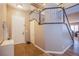 Bright foyer with tiled floor, staircase, and direct access to the living room at 9052 Pine Mission Ave, Las Vegas, NV 89143