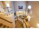 Bright, open-concept living room with soaring ceilings and a stylish staircase at 9052 Pine Mission Ave, Las Vegas, NV 89143