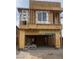 Exterior framing showing a two-story house with a garage and construction still in progress at 9997 River Corral St, Las Vegas, NV 89166