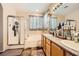 Bathroom showcasing a bathtub, shower and dual vanities at 10798 Muscari Way, Las Vegas, NV 89141