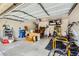 Spacious two car garage with ample storage and overhead lighting at 10798 Muscari Way, Las Vegas, NV 89141