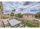 Relaxing outdoor patio with seating area and neighborhood views at 10798 Muscari Way, Las Vegas, NV 89141
