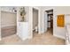Bright bathroom showcasing the sink, toilet, and walk-in closet in an open space at 1124 Whistle Ct, Henderson, NV 89011