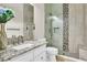 Beautiful bathroom featuring a glass shower with seat, granite countertops, and modern finishes at 1124 Whistle Ct, Henderson, NV 89011