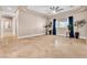 Open living room with tile floors, neutral walls, large windows, and recessed lighting at 1124 Whistle Ct, Henderson, NV 89011