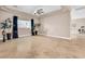 Expansive living room with tile flooring, neutral walls, recessed lighting, and a ceiling fan at 1124 Whistle Ct, Henderson, NV 89011