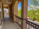 View of the balcony with decorative iron railings and desert landscaping at 2805 Proust Ct, Henderson, NV 89044