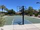 Enjoy a community basketball court on sunny day with well-maintained grounds and mature landscaping at 2805 Proust Ct, Henderson, NV 89044