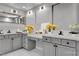 Modern bathroom vanity featuring dual sinks, sleek fixtures, and ample counter space at 2805 Proust Ct, Henderson, NV 89044