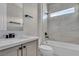 Stylish bathroom featuring modern vanity, new fixtures, and a tiled shower-tub combination at 2805 Proust Ct, Henderson, NV 89044