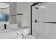 Bright bathroom with a modern shower, sink, and towel rack at 2805 Proust Ct, Henderson, NV 89044