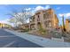 Exterior view of home with manicured landscaping, desert foliage, and covered porch at 2805 Proust Ct, Henderson, NV 89044