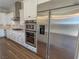 Kitchen features stainless steel appliances including double ovens and a large refrigerator at 2805 Proust Ct, Henderson, NV 89044