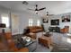 Spacious living room boasts modern decor, comfortable seating and ample natural light at 2805 Proust Ct, Henderson, NV 89044
