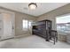 Bright bedroom with dark wood bunk bed and neutral walls, offering a cozy and versatile space at 2824 Sisteron Ct, Henderson, NV 89044