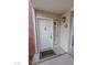Inviting front door and entry with exterior wall showing brick and a diamond-shaped address plaque at 2866 Loveland Dr # 2017, Las Vegas, NV 89109