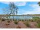 Picturesque community lake view showcasing walking paths and lush landscaping at 301 Resolute Ave, Henderson, NV 89011