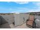 Relaxing rooftop patio offering comfortable seating and peaceful views of the surrounding neighborhood at 301 Resolute Ave, Henderson, NV 89011