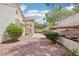 Private backyard featuring low-maintenance landscaping and a covered patio area at 3029 Paseo Hills Way, Henderson, NV 89052