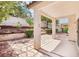 Charming covered patio features brick flooring and serene outdoor views, ideal for relaxing at 3029 Paseo Hills Way, Henderson, NV 89052