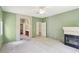 Main bedroom features a fireplace, ceiling fan, and ensuite bathroom with a walk-in closet at 3029 Paseo Hills Way, Henderson, NV 89052