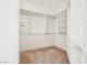 Well-organized walk-in closet features ample shelving and hanging space, for optimal storage at 3029 Paseo Hills Way, Henderson, NV 89052