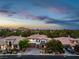 An aerial view of a beautiful suburban home showcasing its prime location and surroundings at 42 Carolina Cherry Dr, Las Vegas, NV 89141
