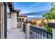 Relaxing balcony view with wrought iron railing overlooking the picturesque neighborhood and desert scenery at 42 Carolina Cherry Dr, Las Vegas, NV 89141