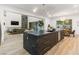 Open kitchen featuring a large island, view of the dining area, and seamless access to the living space at 42 Carolina Cherry Dr, Las Vegas, NV 89141