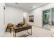 Office space with modern desk and leather chairs with a slider for outdoor access at 42 Carolina Cherry Dr, Las Vegas, NV 89141