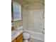 Bathroom with a tub and shower combination and a window at 4675 Color Up Ct # 101, Las Vegas, NV 89122