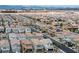 High-angle shot showcasing a densely populated residential area with similar-style houses and roads at 4698 Lucky Jade Ave, Las Vegas, NV 89141