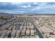 Expansive aerial view of a residential community with modern homes and well-maintained streets at 4698 Lucky Jade Ave, Las Vegas, NV 89141