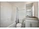 Pristine bathroom with modern vanity, bathtub, and neutral tones at 4698 Lucky Jade Ave, Las Vegas, NV 89141