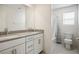 Clean bathroom featuring double sinks, modern fixtures, and a shower-tub combo at 4698 Lucky Jade Ave, Las Vegas, NV 89141