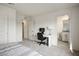 Comfortable bedroom with a functional workspace and a tranquil bathroom at 4698 Lucky Jade Ave, Las Vegas, NV 89141