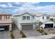 Charming two-story home featuring a two-car garage, well-kept landscaping, and a welcoming facade at 4698 Lucky Jade Ave, Las Vegas, NV 89141