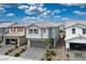 Picturesque two-story home with a two-car garage, lovely landscaping, and classic architectural elements at 4698 Lucky Jade Ave, Las Vegas, NV 89141
